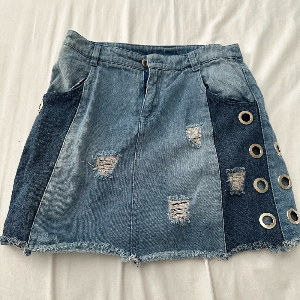 Denim Distressed Skirt with Grommet Detail